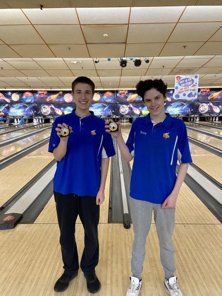 Kenny Miner and his teammate Aneis Zerillo celebrating first and third place at Big North Tournament. 
(Photo courtesy of Kenny Miner)