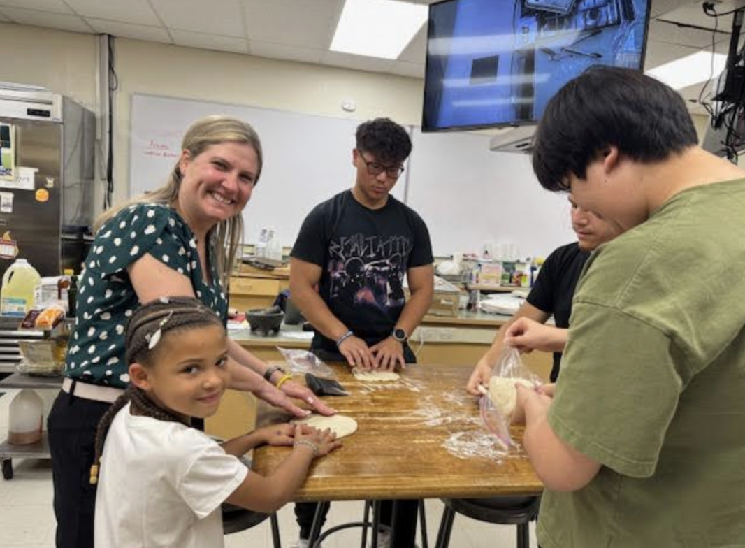 Kids and teens making pizza in NVD culinary class. Photo courtesy of Jessica Miano