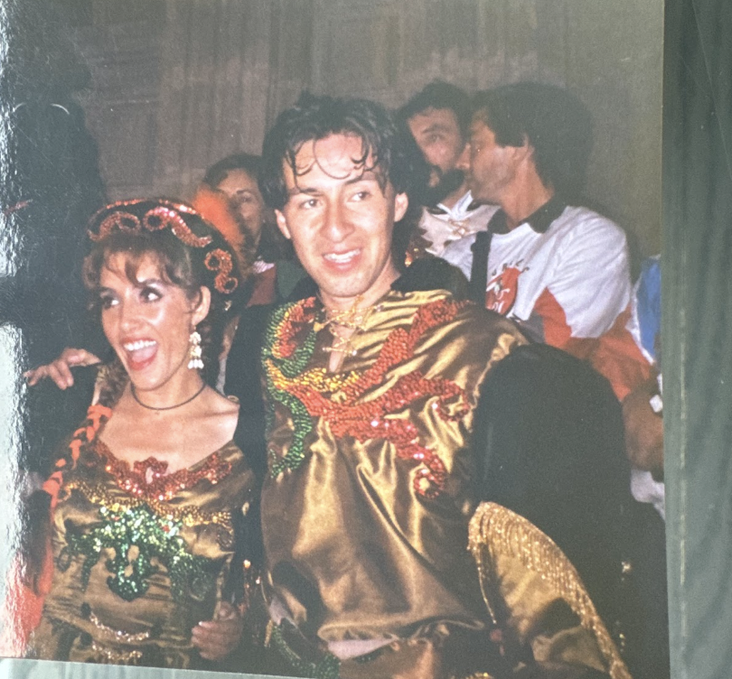 Pacheco and Vega in Bolivian Caporales Costumes at Carnaval De Oruro