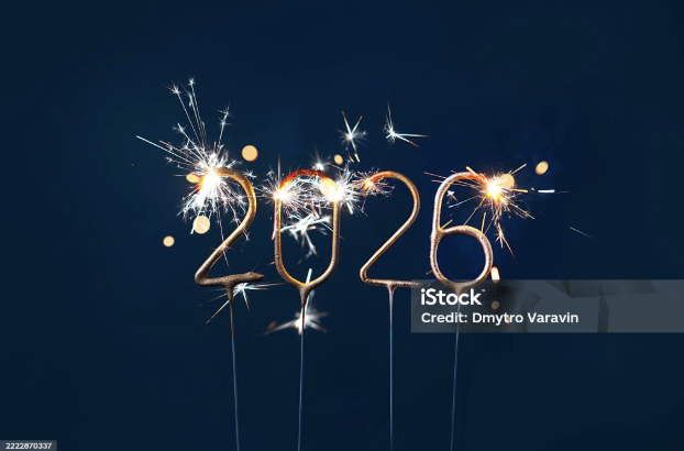 New Year 2026 numbers made with glowing sparklers 
