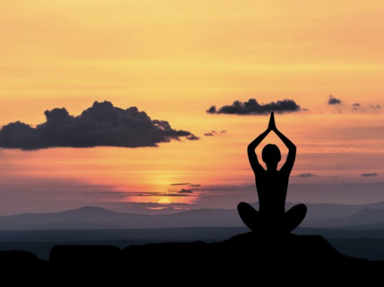 Yoga pose at sunset